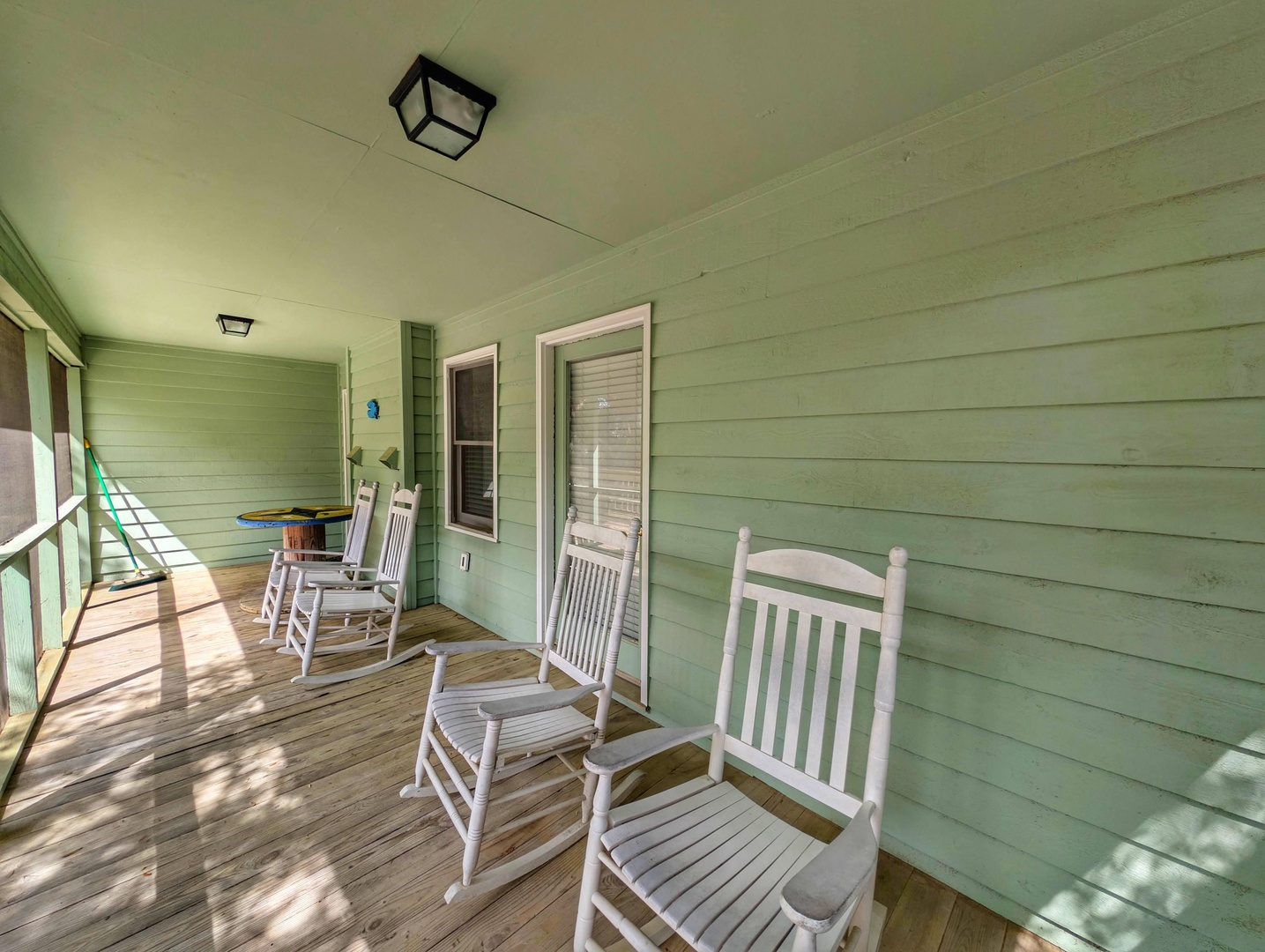 Picture yourself in a classic rocking chair on your private porch, swaying gently as soft sunlight dances through the leaves and warm breezes drift by—your peaceful retreat awaits.