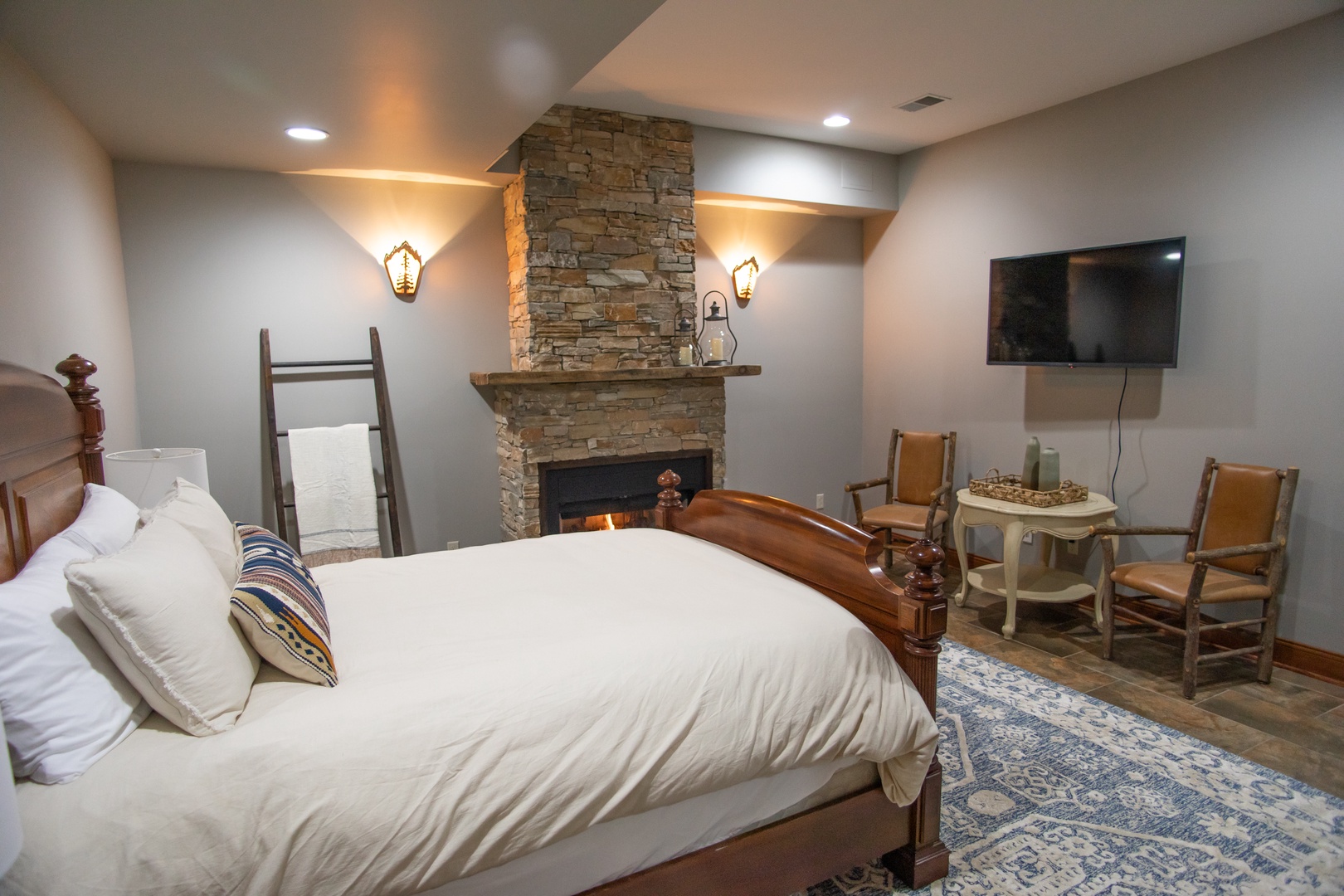 The main bedroom has everything needed for an evening retreat away from the others.