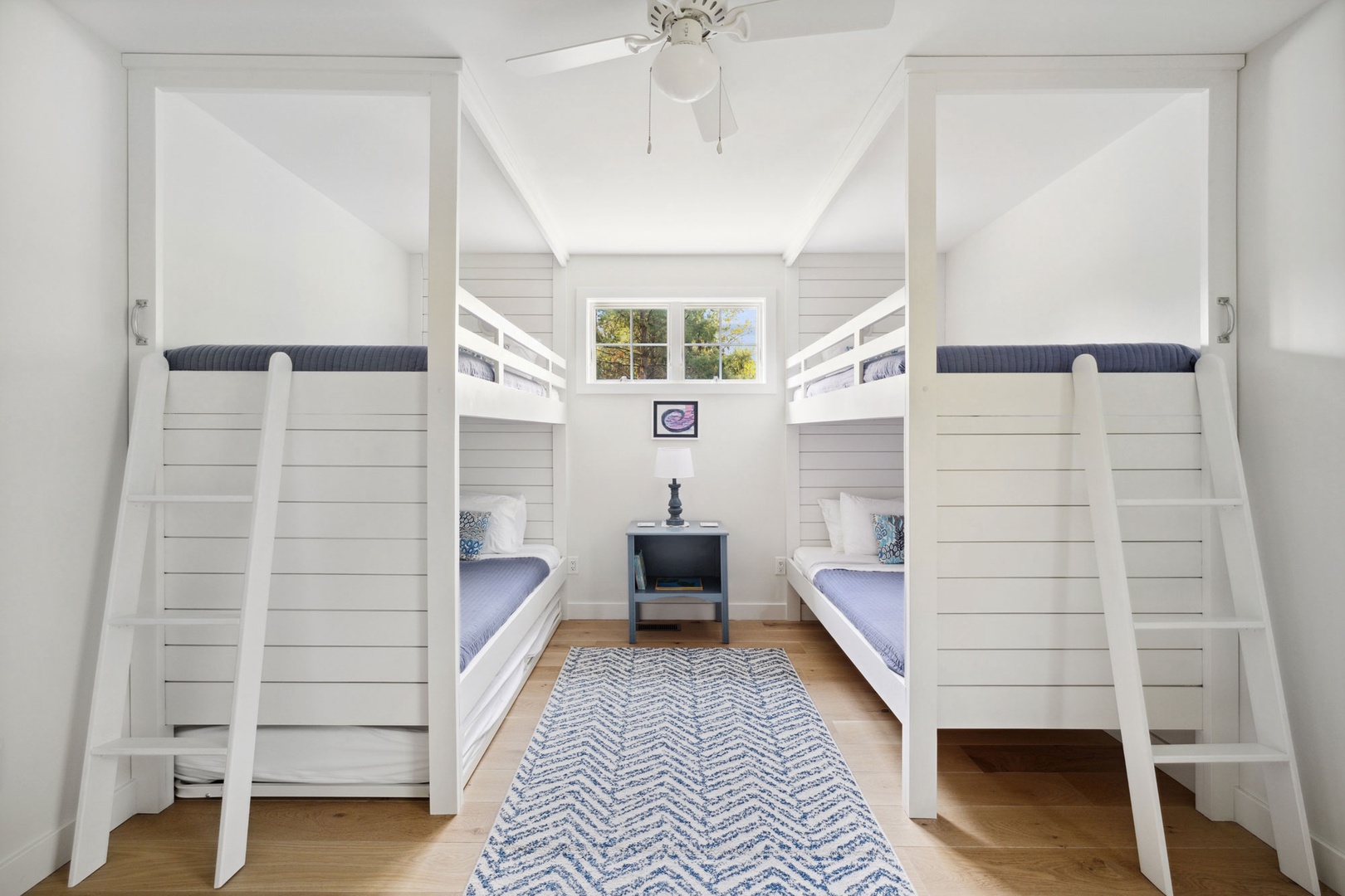 This cozy bunkroom is perfect for kids and adults alike.