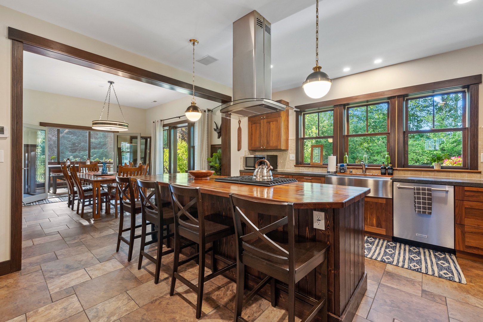 This exquisite island composed of a combination of walnut and cherry is ideal for entertaining.