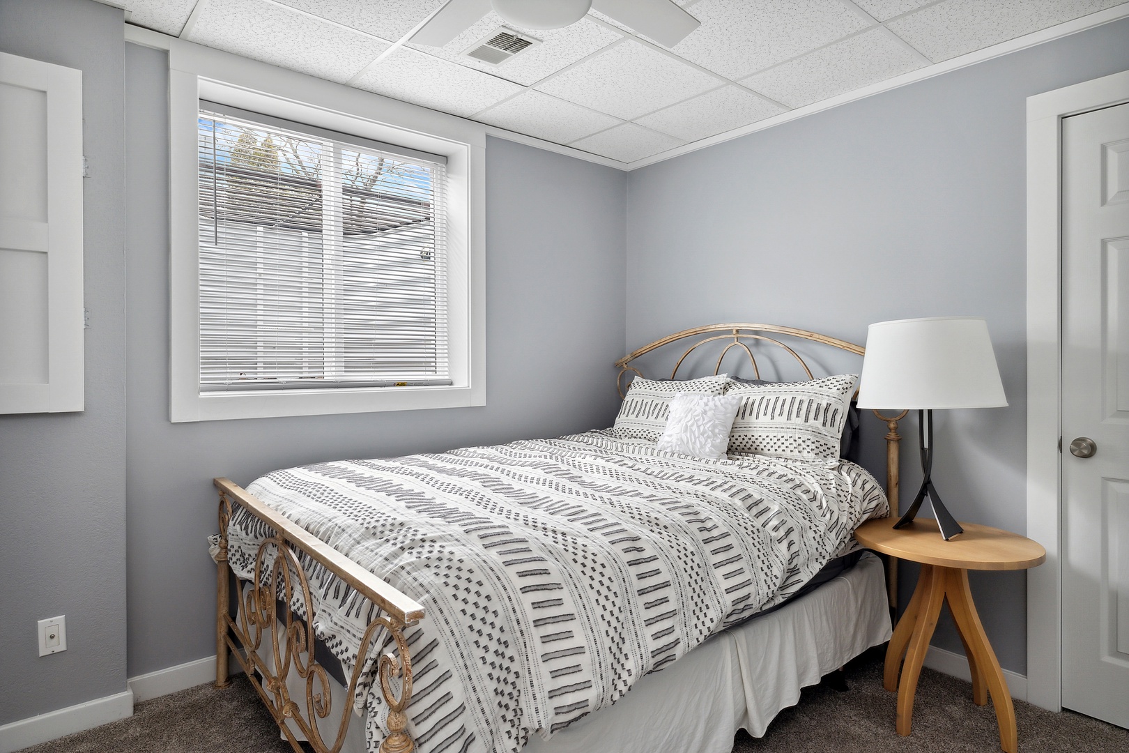 Enjoy a restful stay in this spacious bedroom at Main Destination.