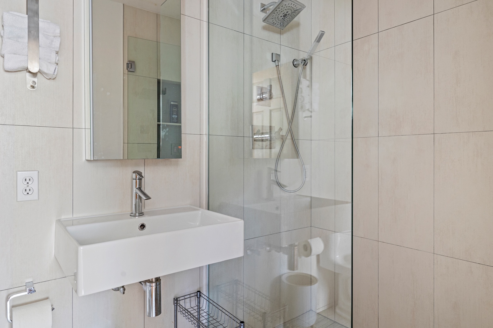 Clean and sleek main ensuite's bath.