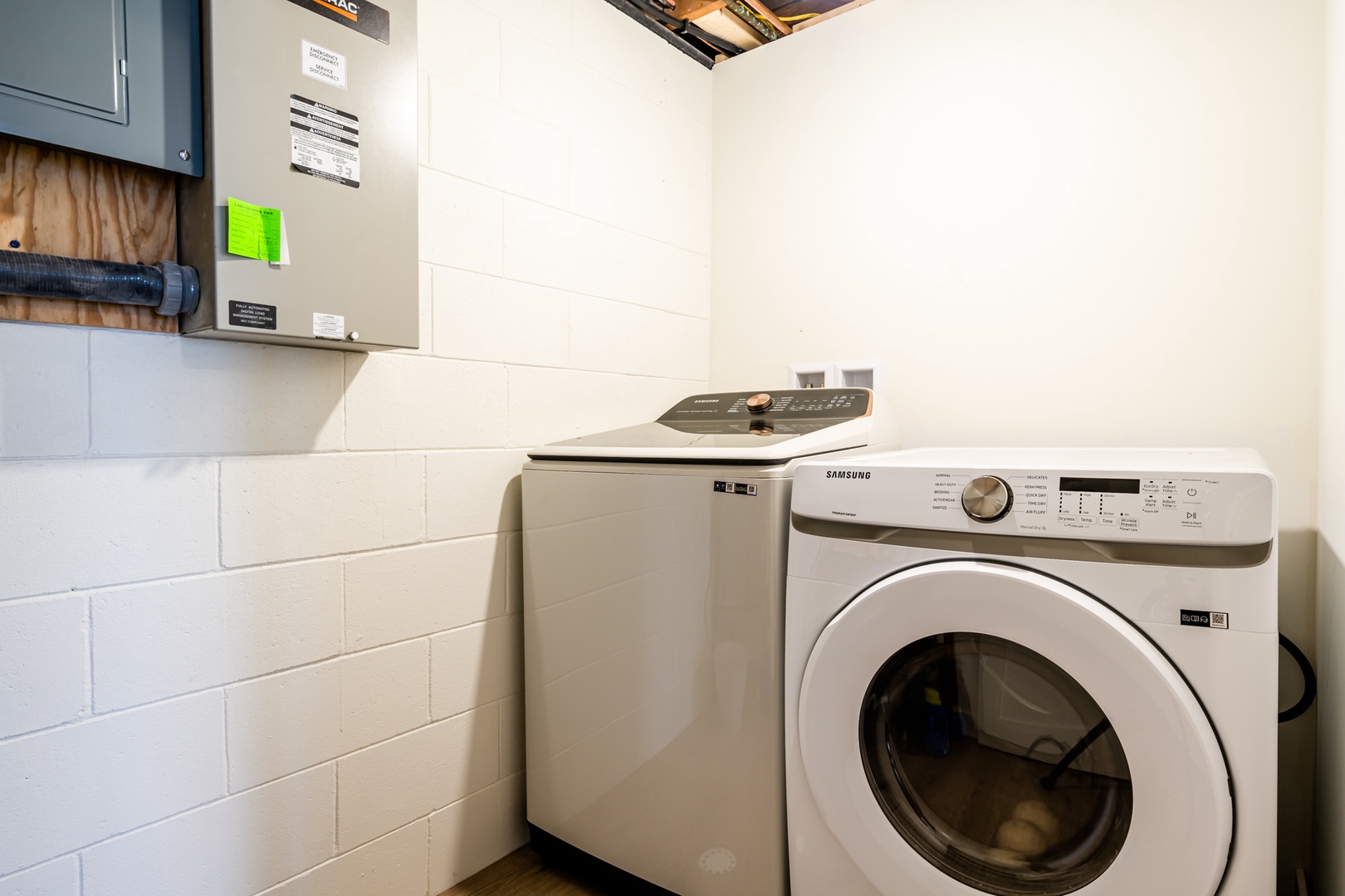 The laundry room has a high-quality washer and dryer, plus the essentials.