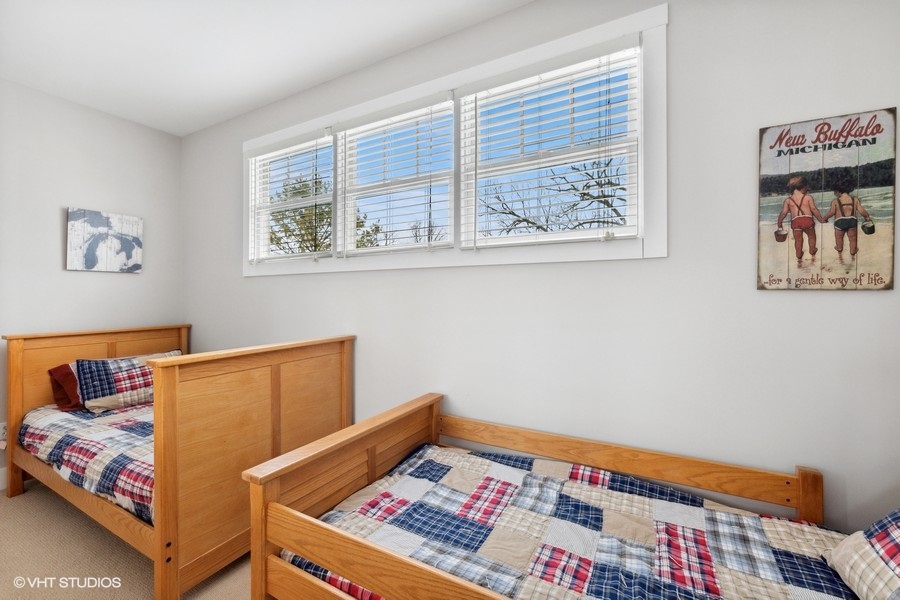 Rest your head after a fun-filled day in this cozy bedroom with two twin beds.