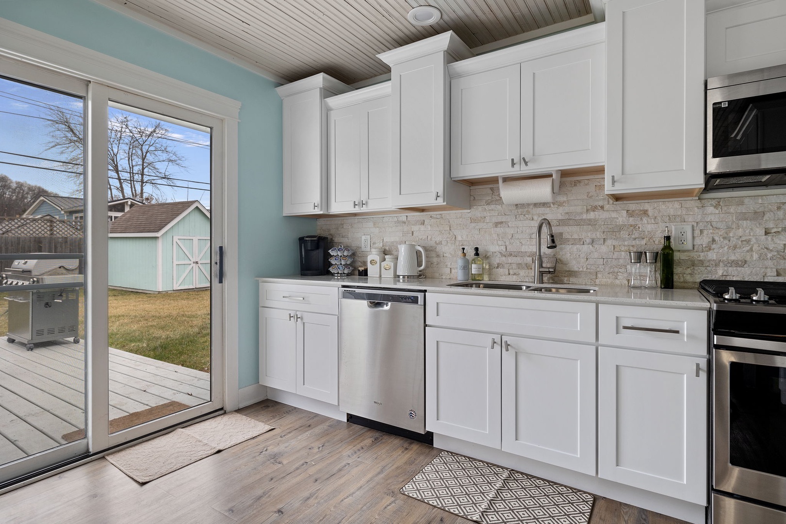The kitchen features high-quality stainless-steel appliances and all the basics.