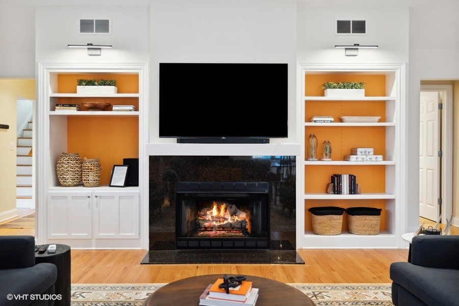 Cozy up by the sleek gas fireplace.