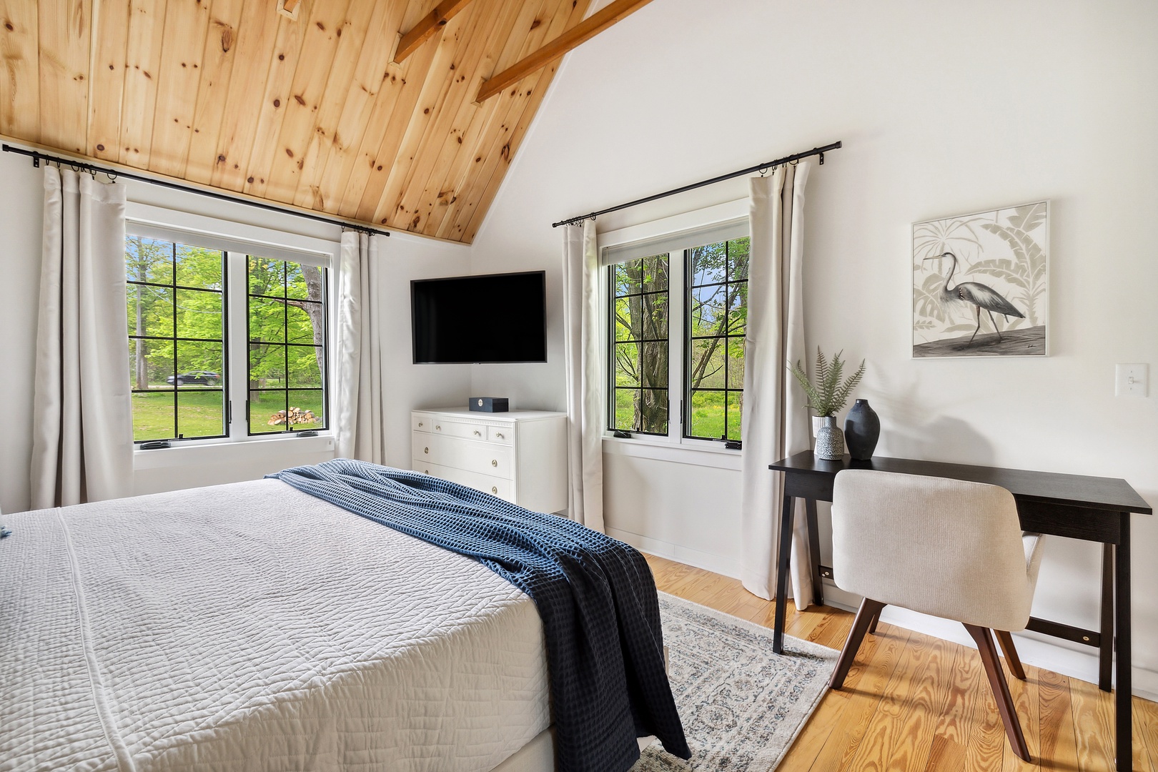 Unwind after a day of vacation fun in the primary King ensuite bedroom.