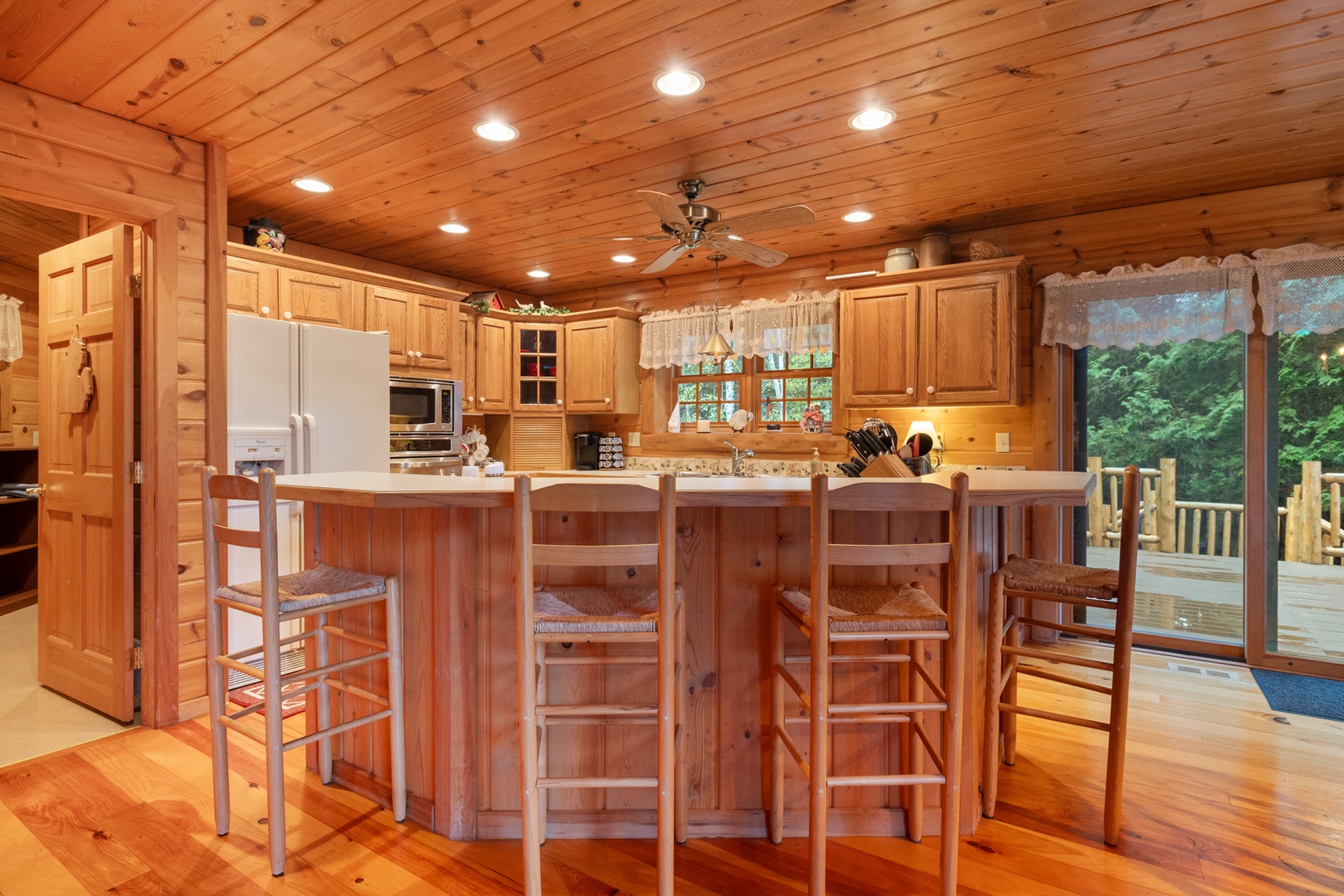 Each morning, this custom kitchen island becomes coffee lovers' Central Station.