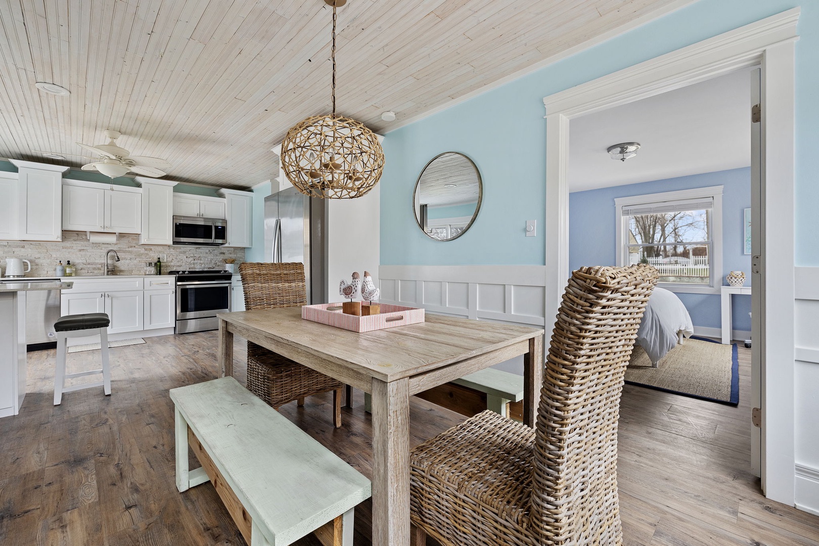 The open design of the kitchen-breakfast nook-dining room provides extra space.