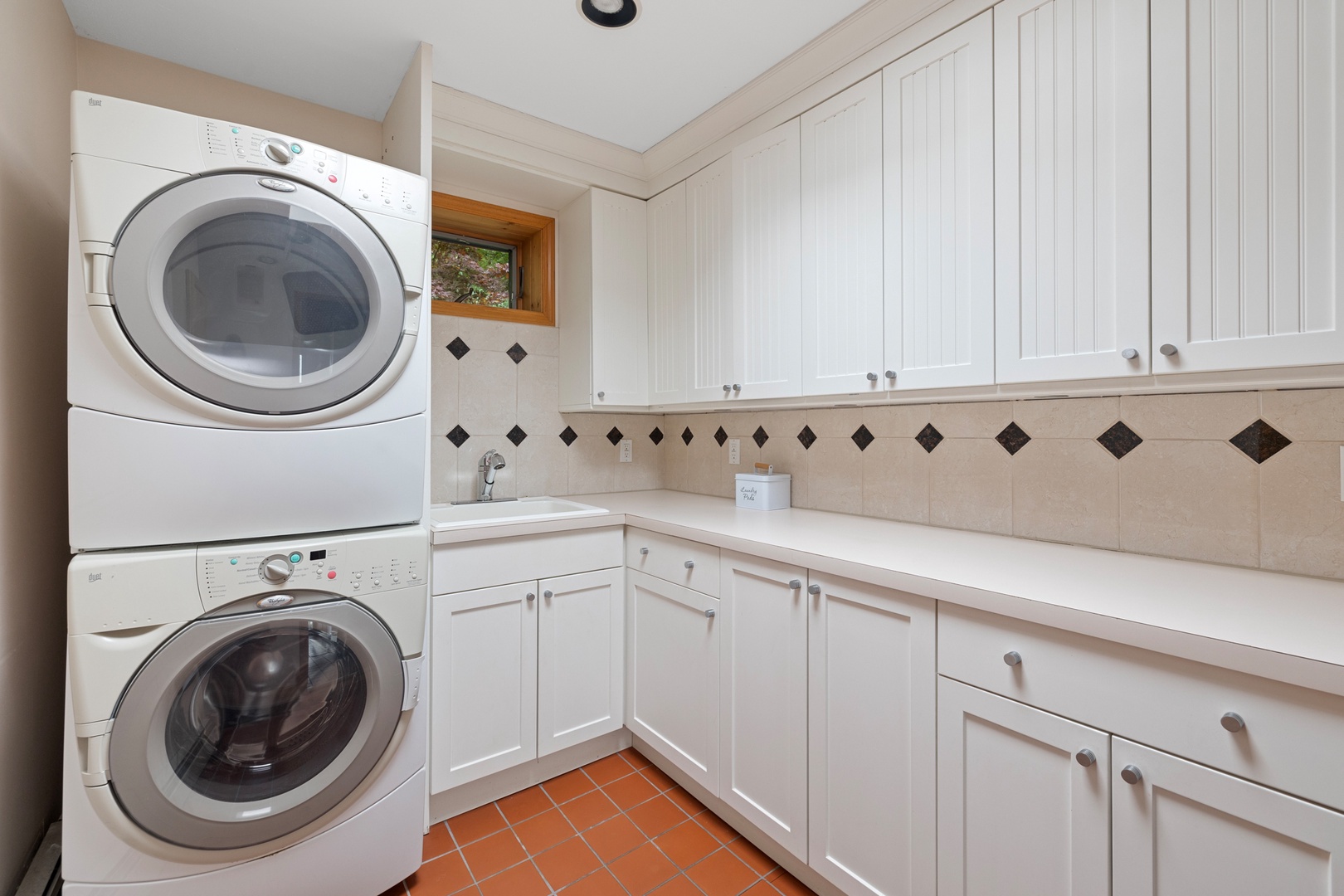 Take care of your laundry needs with ease with the convenient laundry room.