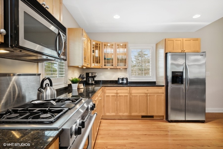 With ample counter space and storage, this kitchen is equipped for preparing a variety of meals.