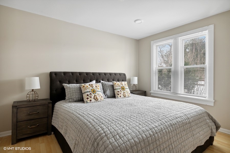 Welcome to the primary bedroom at Summer Breeze. Rest easy with plush comfort and luxurious linens.