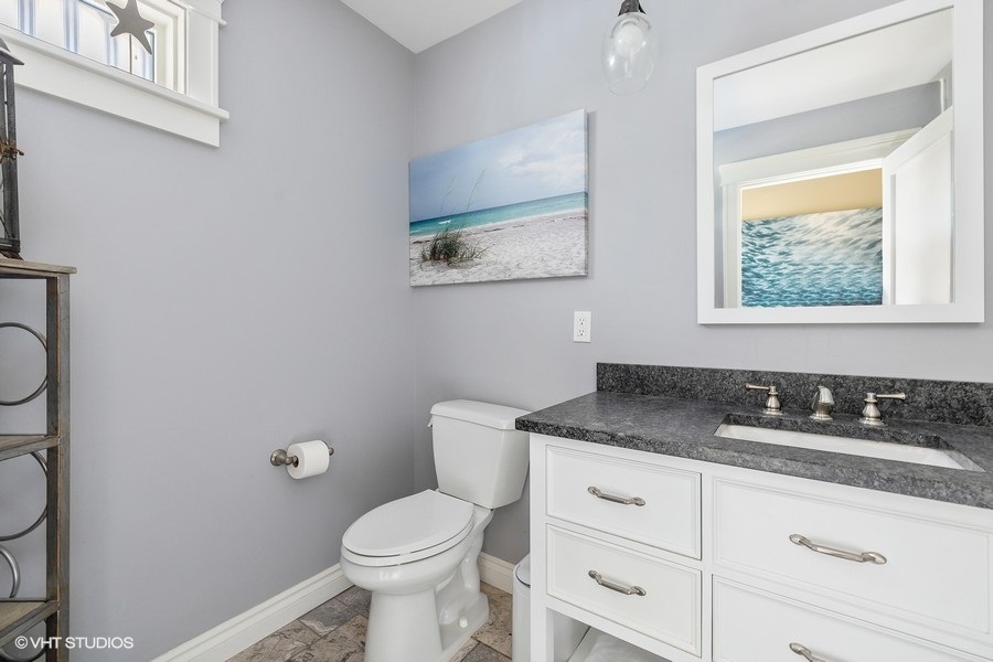 Enjoy privacy in this functional bathroom, equipped with all the essentials.