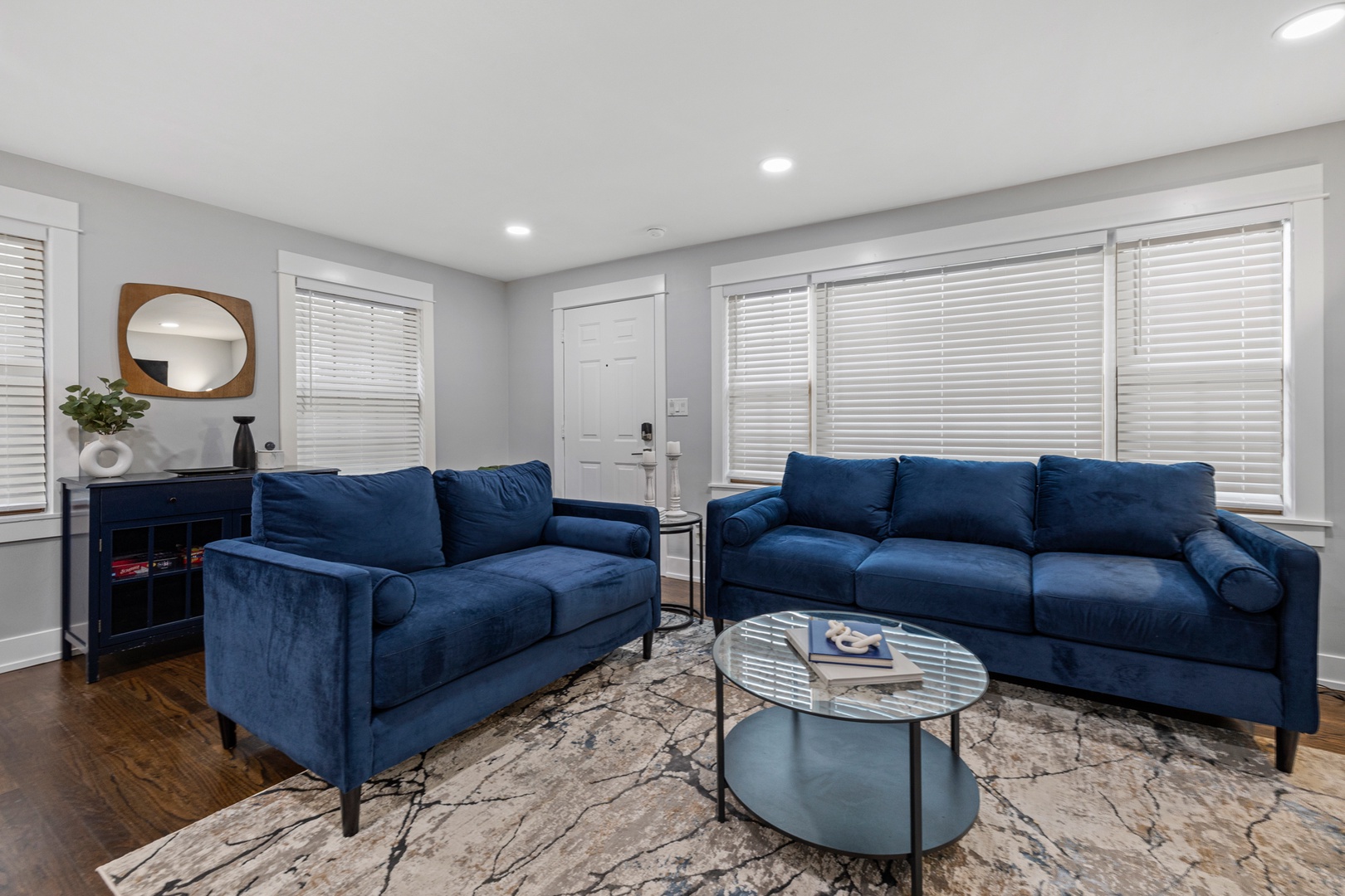Upstairs has a beautiful living room with cozy furnishings.