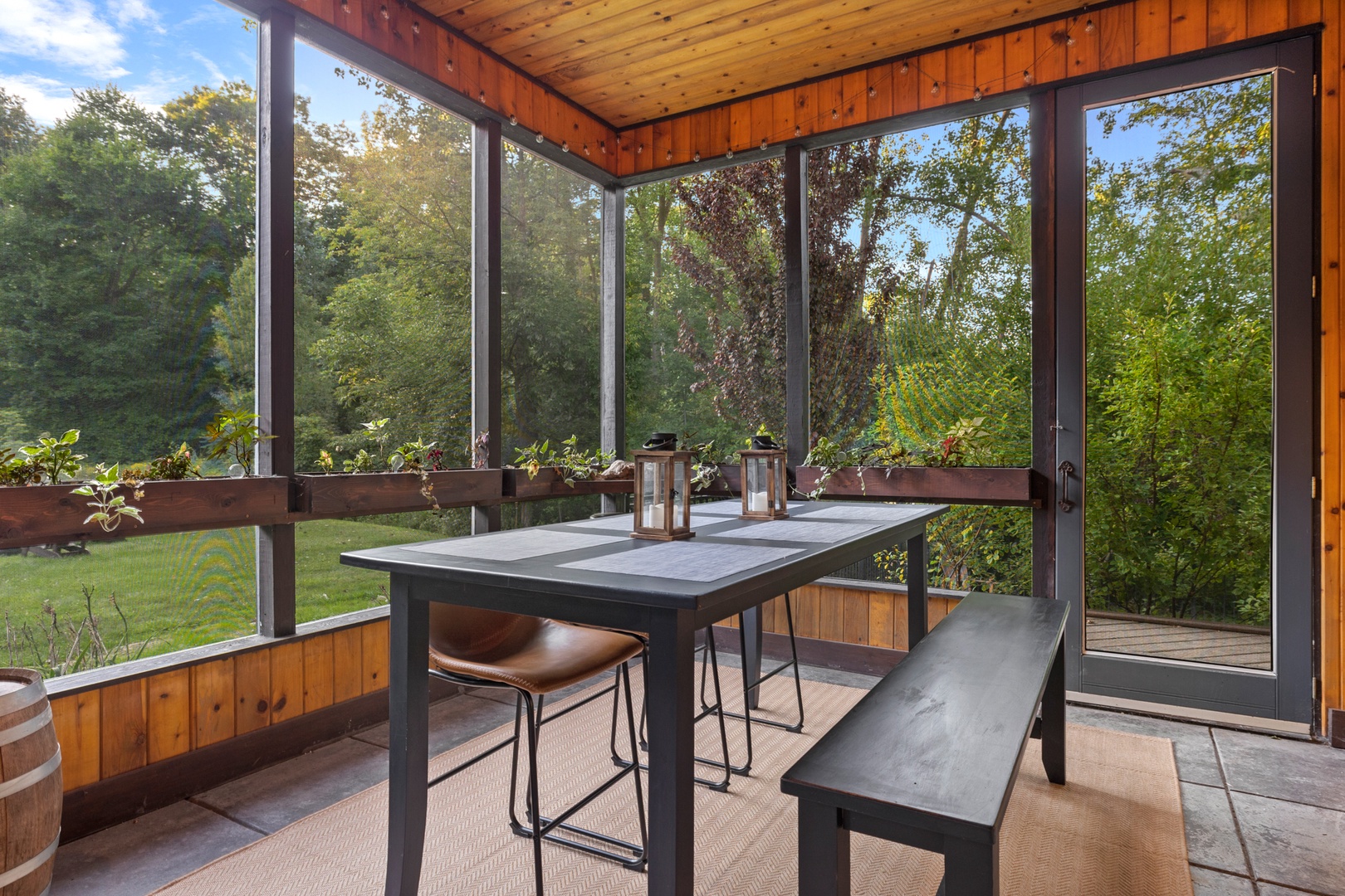 Connect with nature when dinner is served on the porch’s beautiful dining table.