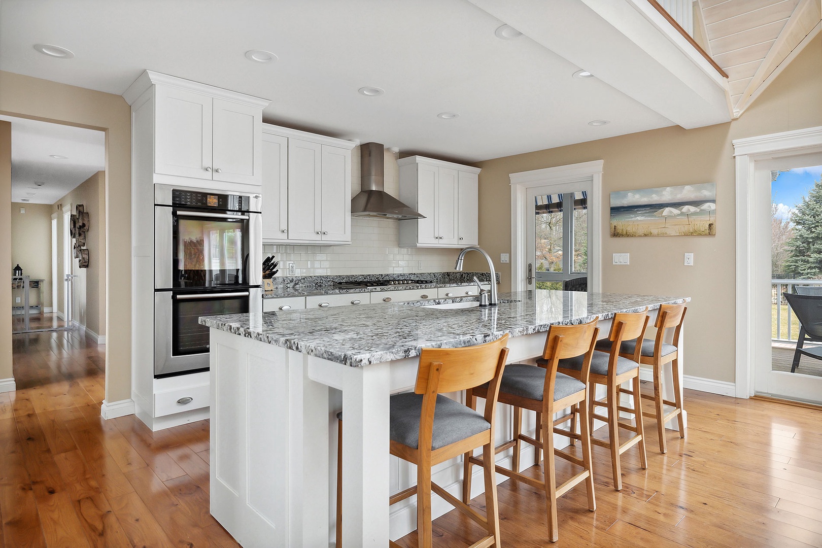 Pull up a stool and enjoy a casual meal or quick snack at the kitchen island.
