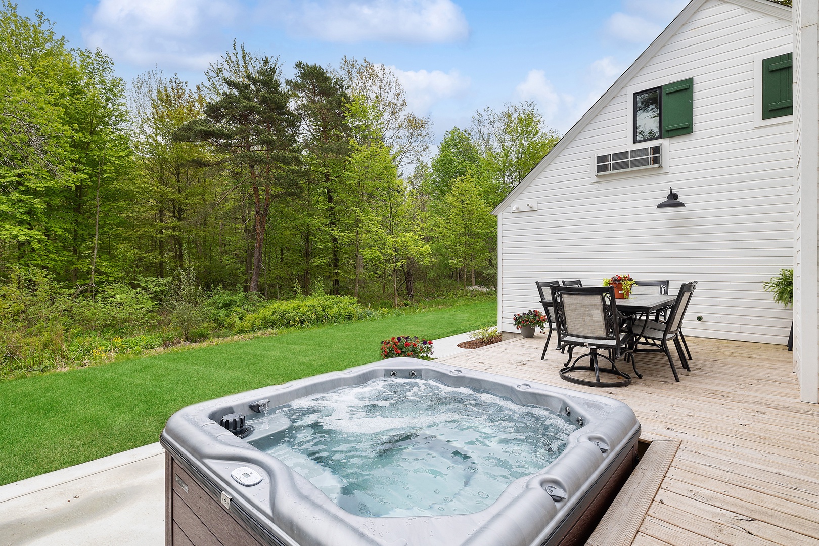 Escape to relax and unwind in our private backyard hot tub.