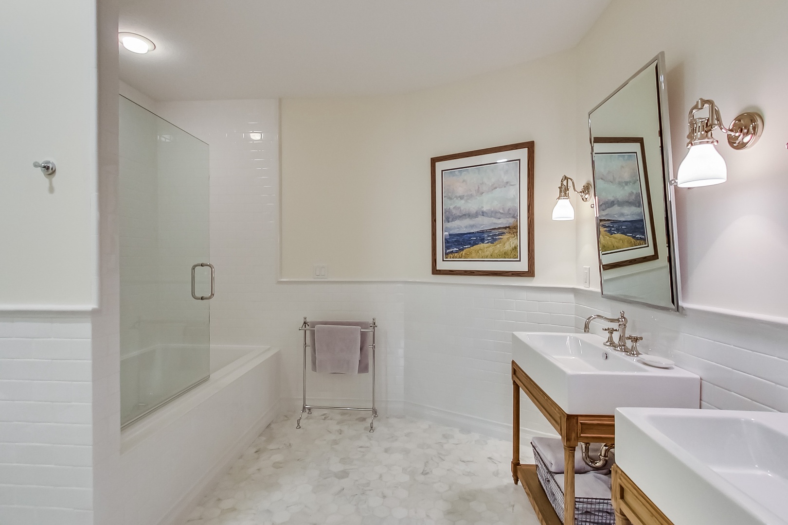 Want to take a relaxing bath? This bathroom has a soaking tub and tiled shower.