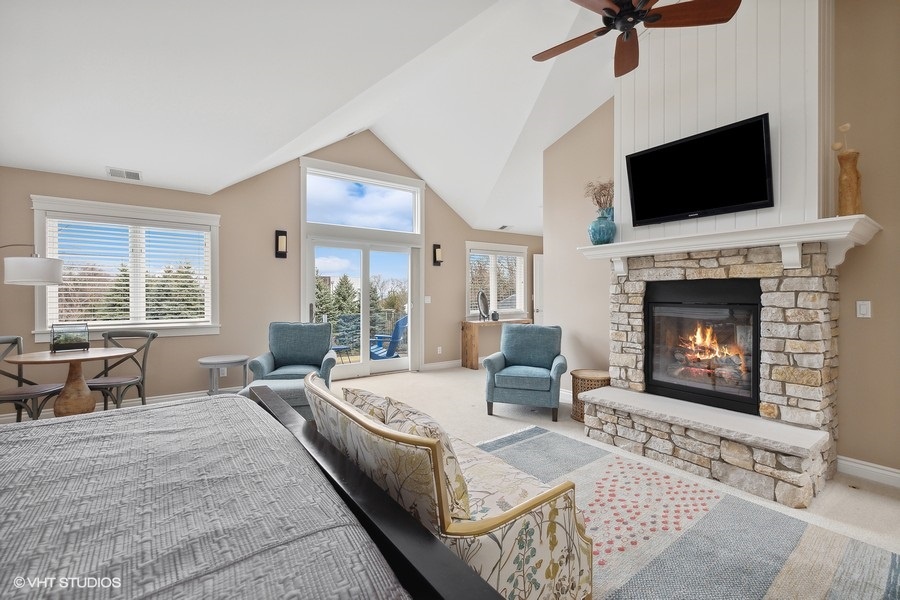With a cozy fireplace and balcony, this space is the perfect escape from the stresses of daily life.
