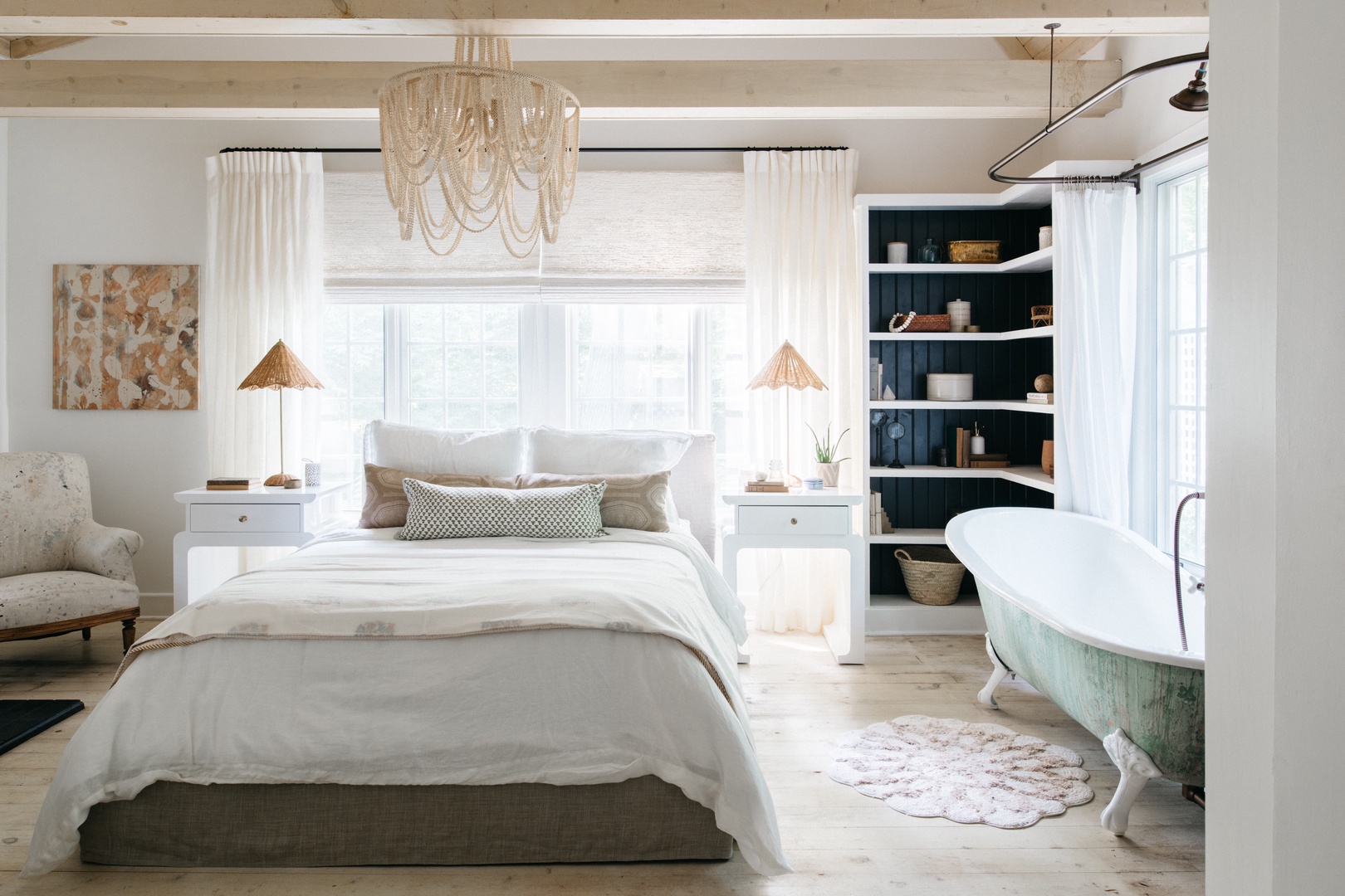 Bathe in vintage elegance and sleep in timeless luxury in the main suite.