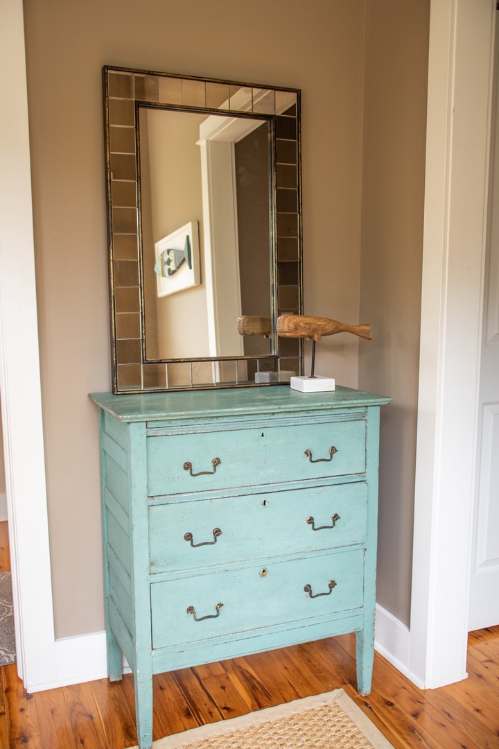 Stylish décor and thoughtful design touches can be found throughout the residence, such as this perfect spot to place your keys.