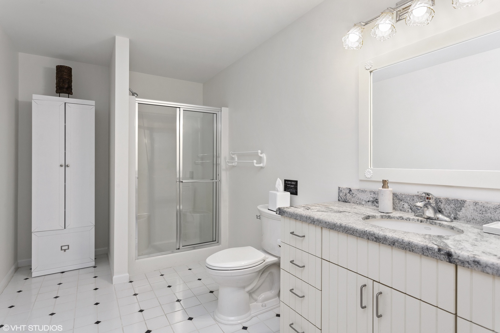 Three full baths are styled with a clean, modern design.