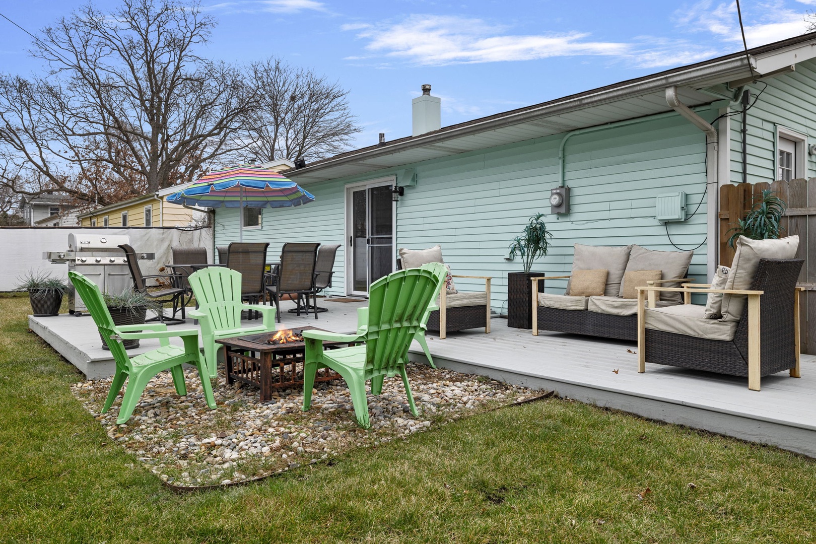 The backyard is a perfect place for you and your guests to hang out together.