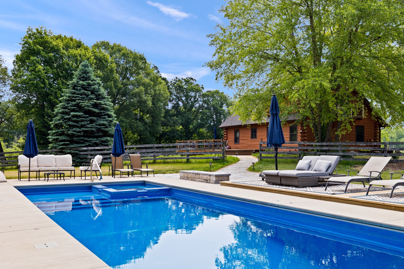 Take a refreshing dip in the swimming pool, surrounded by the serene beauty of the natural landscape.