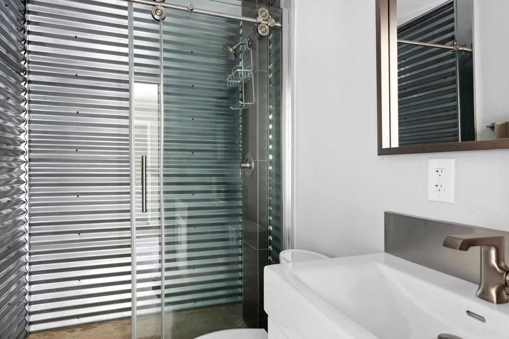 Indulge in the stunning walk-in shower, the perfect place to unwind.