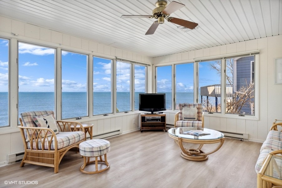 This cozy space offers the perfect spot to unwind and catch up on your favorite shows.