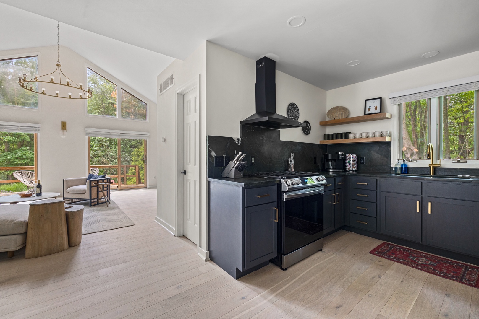 The kitchen is highlighted by an impressive gas stove.