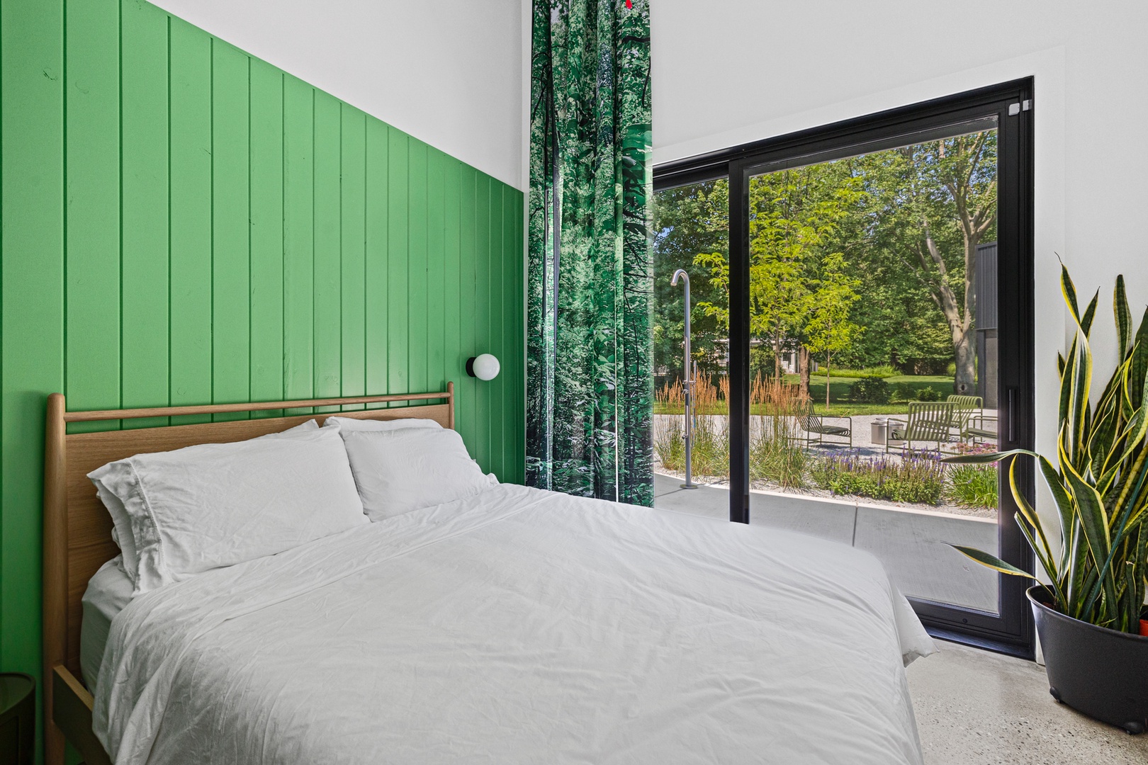 Bedroom #4 has a queen bed and courtyard access.