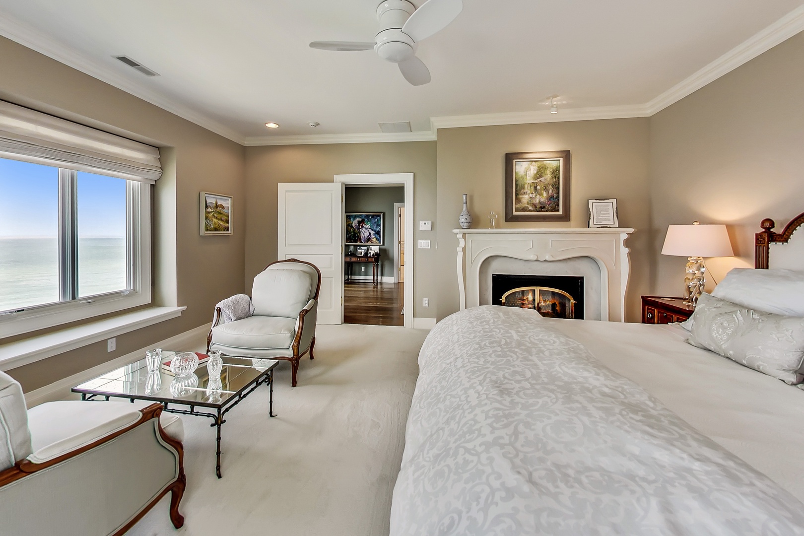 A Master Bedroom fit for Royalty - with a toasty fireplace and fabulous view.