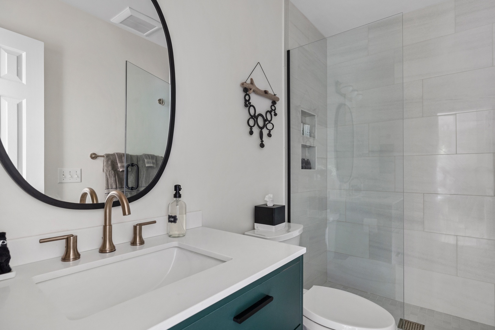 Each bathroom is styled with marble counters & high-end fixtures.