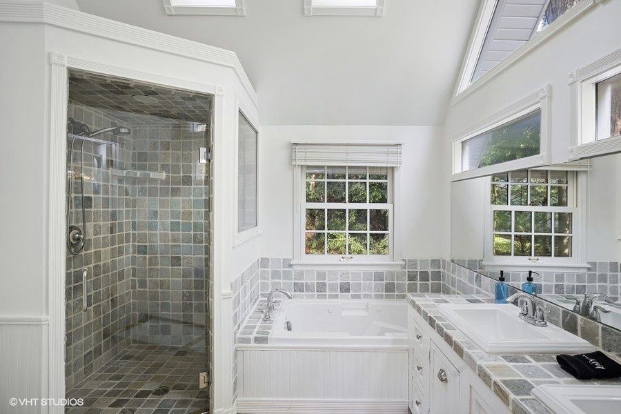 The main ensuite bath is a relaxing sanctuary.
