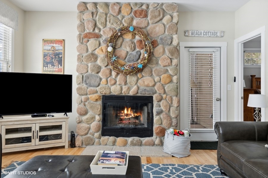 Relax by the cozy fireplace and catch up on your favorite shows or books.
