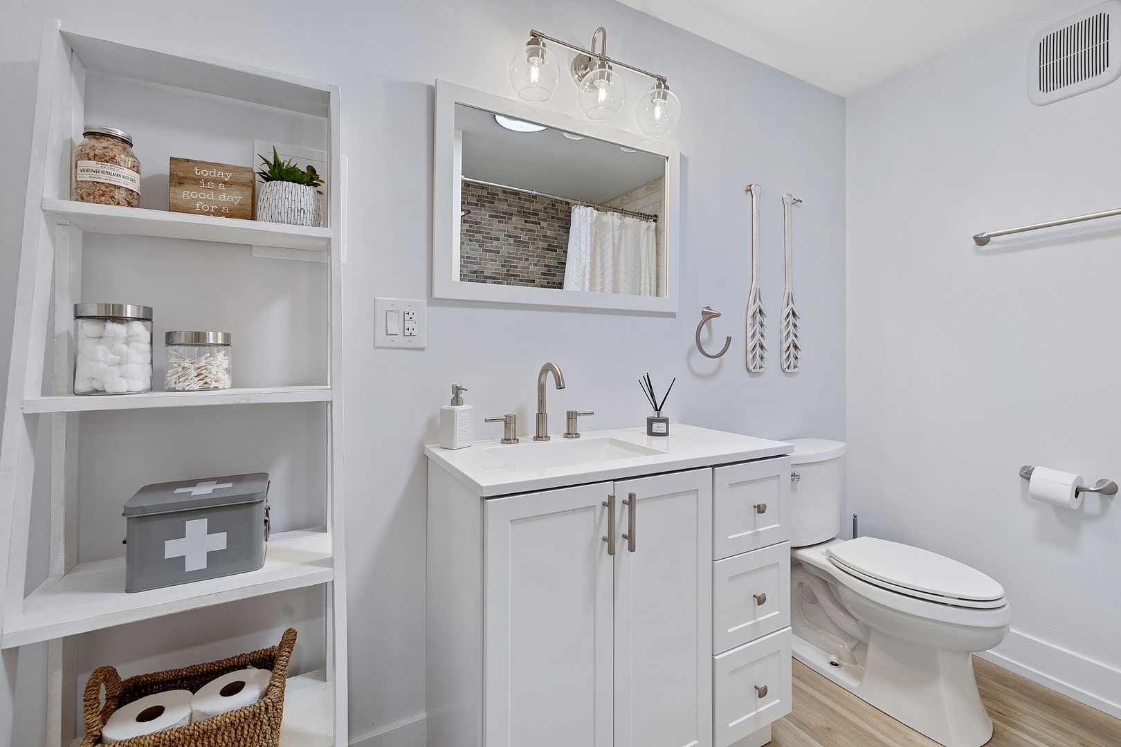 Extra bathroom has stone-top vanity and the essentials for you and your guests.