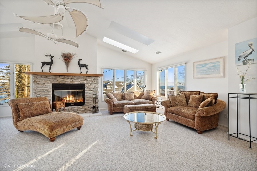 With its soaring ceilings and windows, this space offers a bright and refreshing retreat.