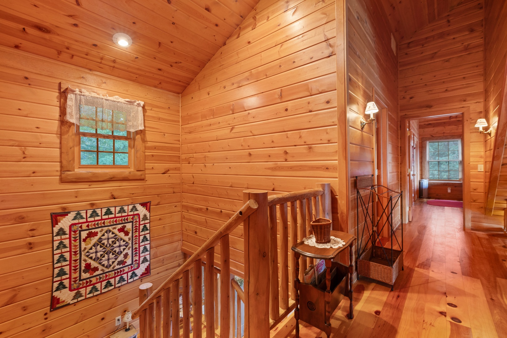 Walking through the upstairs loft you’ll find rustic decor and charming bedrooms.