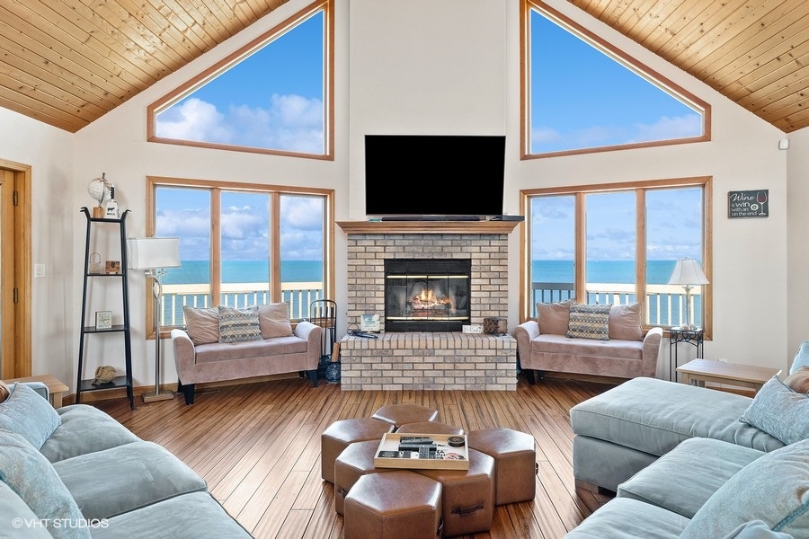 Cozy up on the sectional by the fireplace.