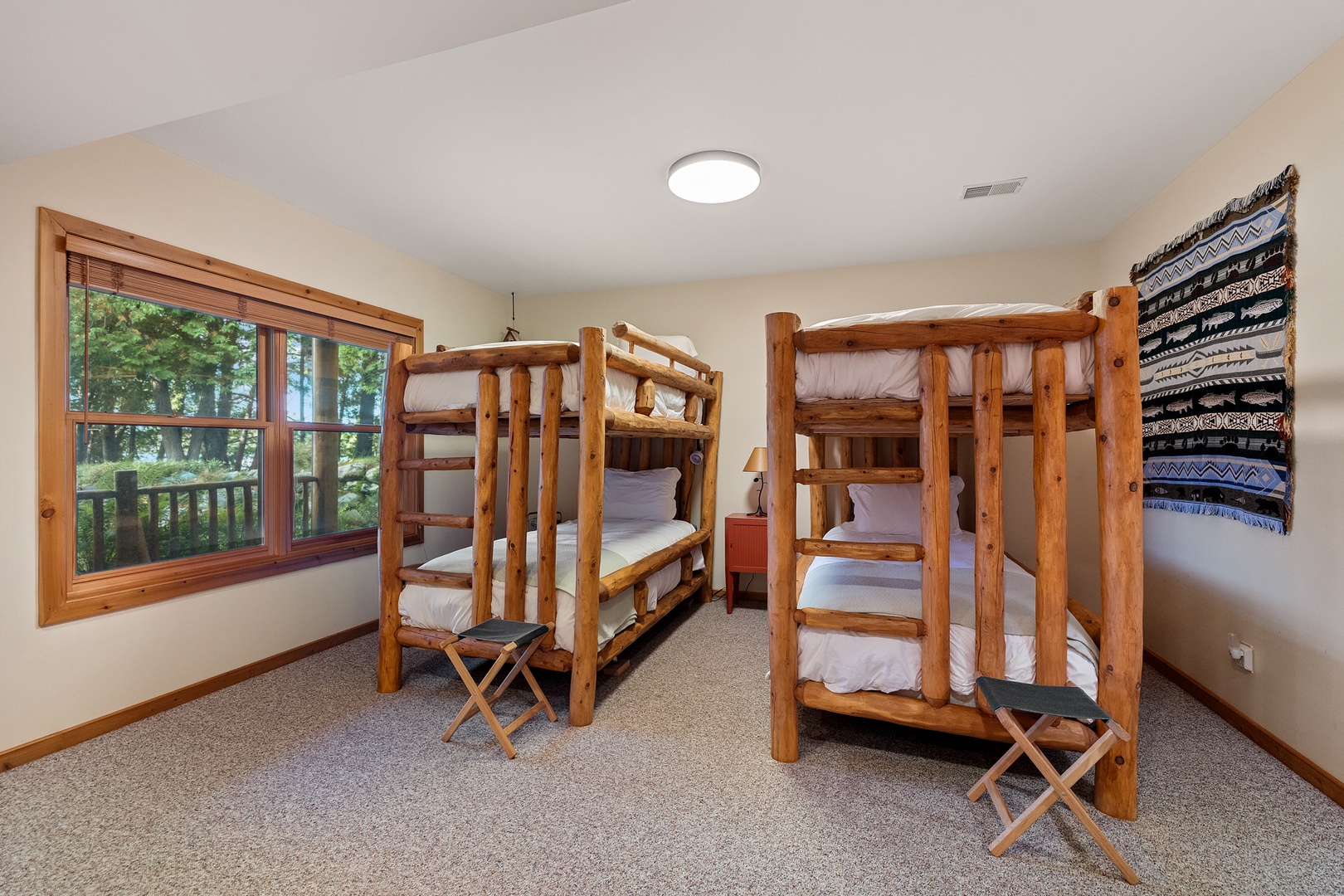 Welcome to the cozy bunkroom, perfect for kids or young adults to share.