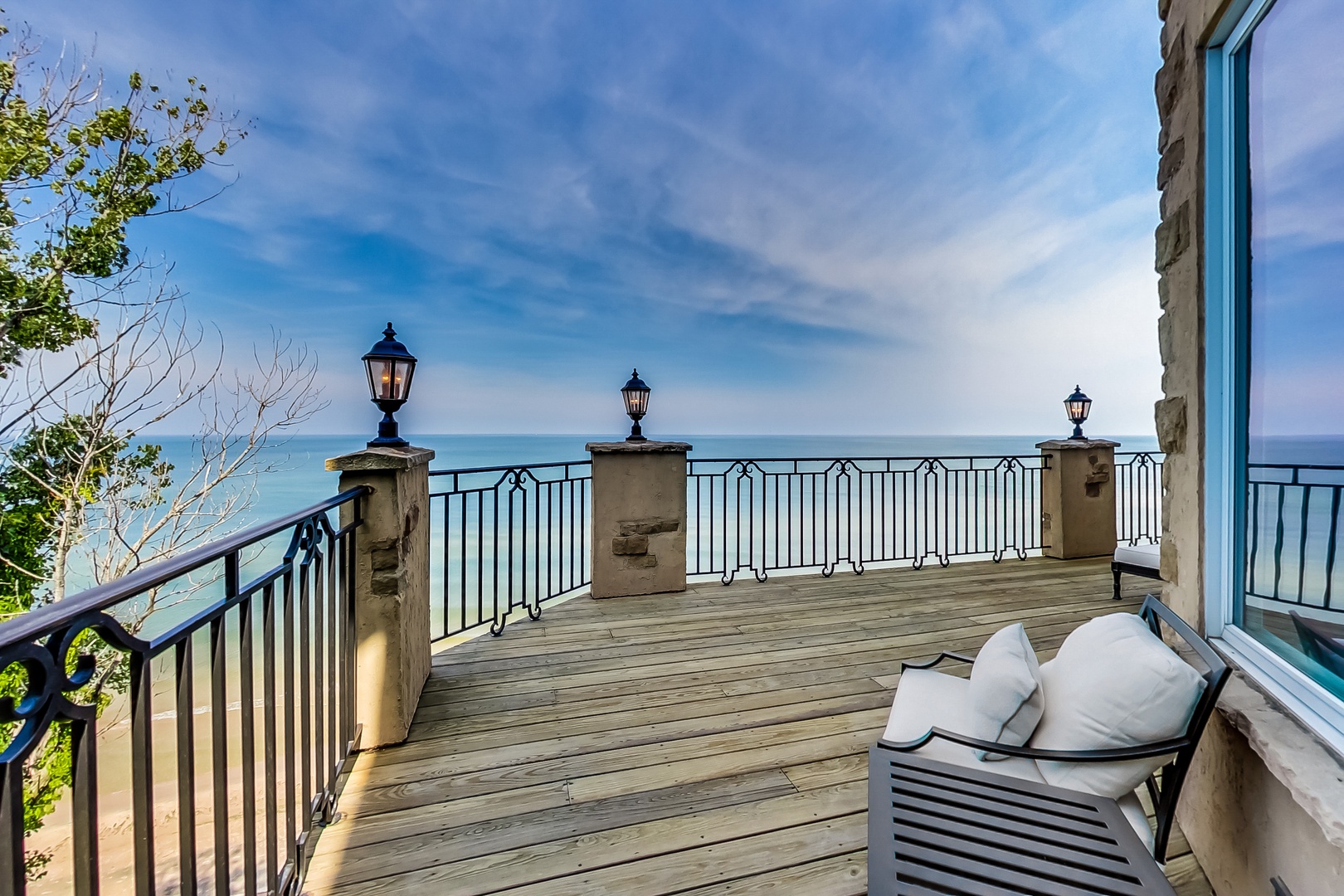 Spend some time on the wraparound deck with comfy seating and to-die-for views.