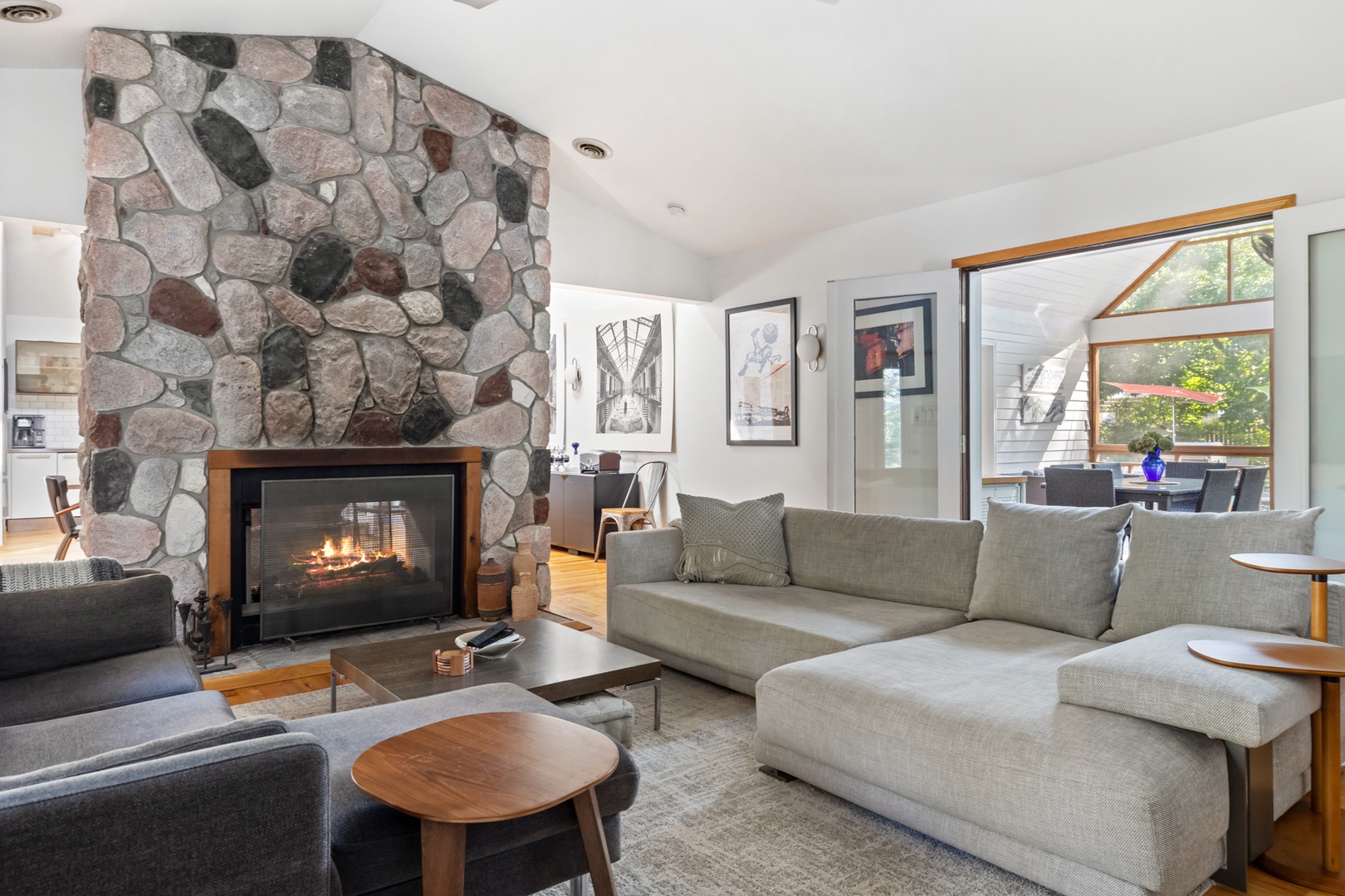 Stretch and relax on this cozy modern couch next to the fire.