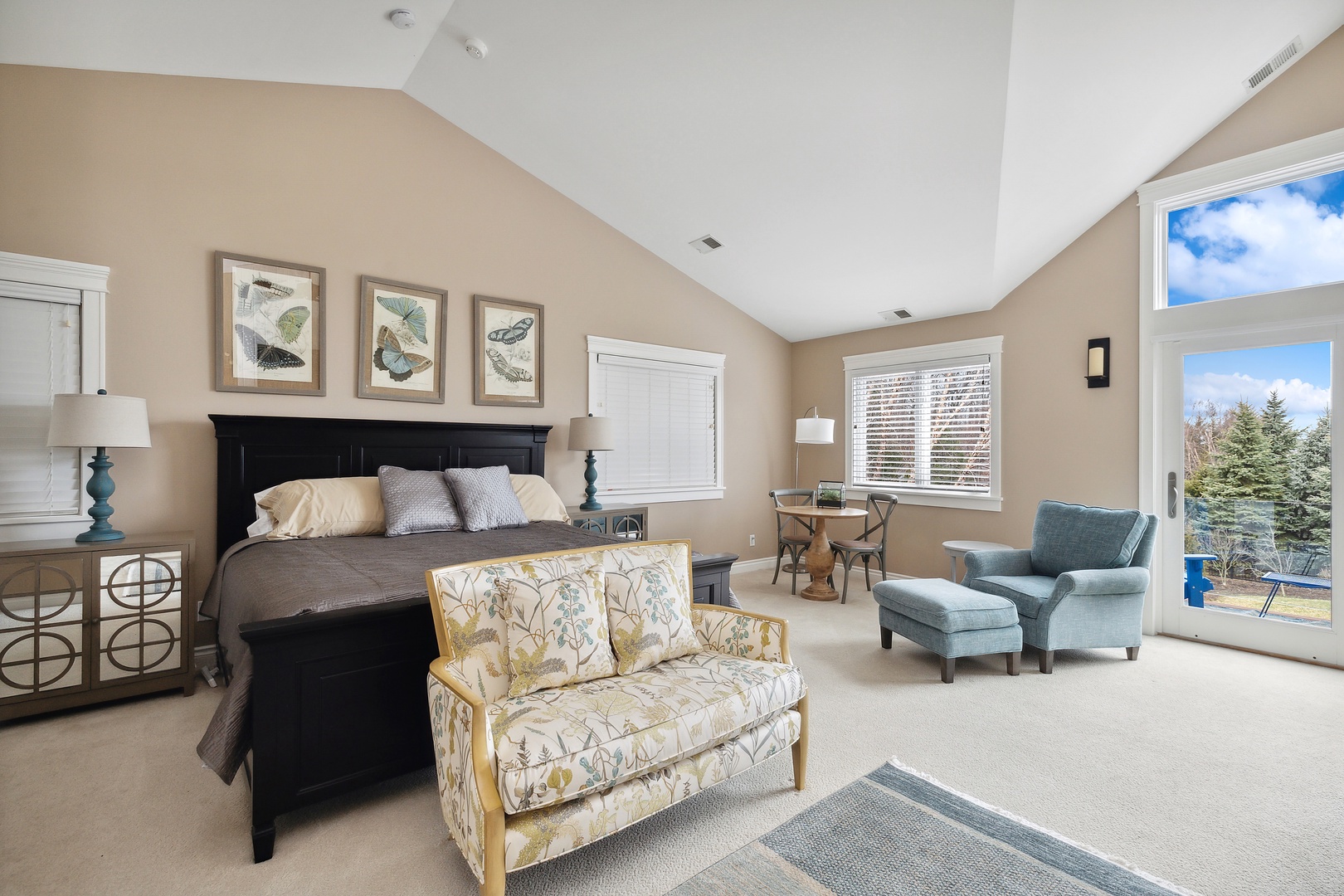 Escape to the spacious primary bedroom, where comfort and style meet in perfect harmony.