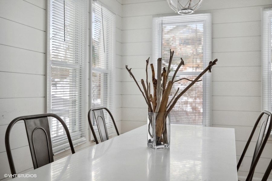 Take a seat and bask in the natural light that floods the dining table.