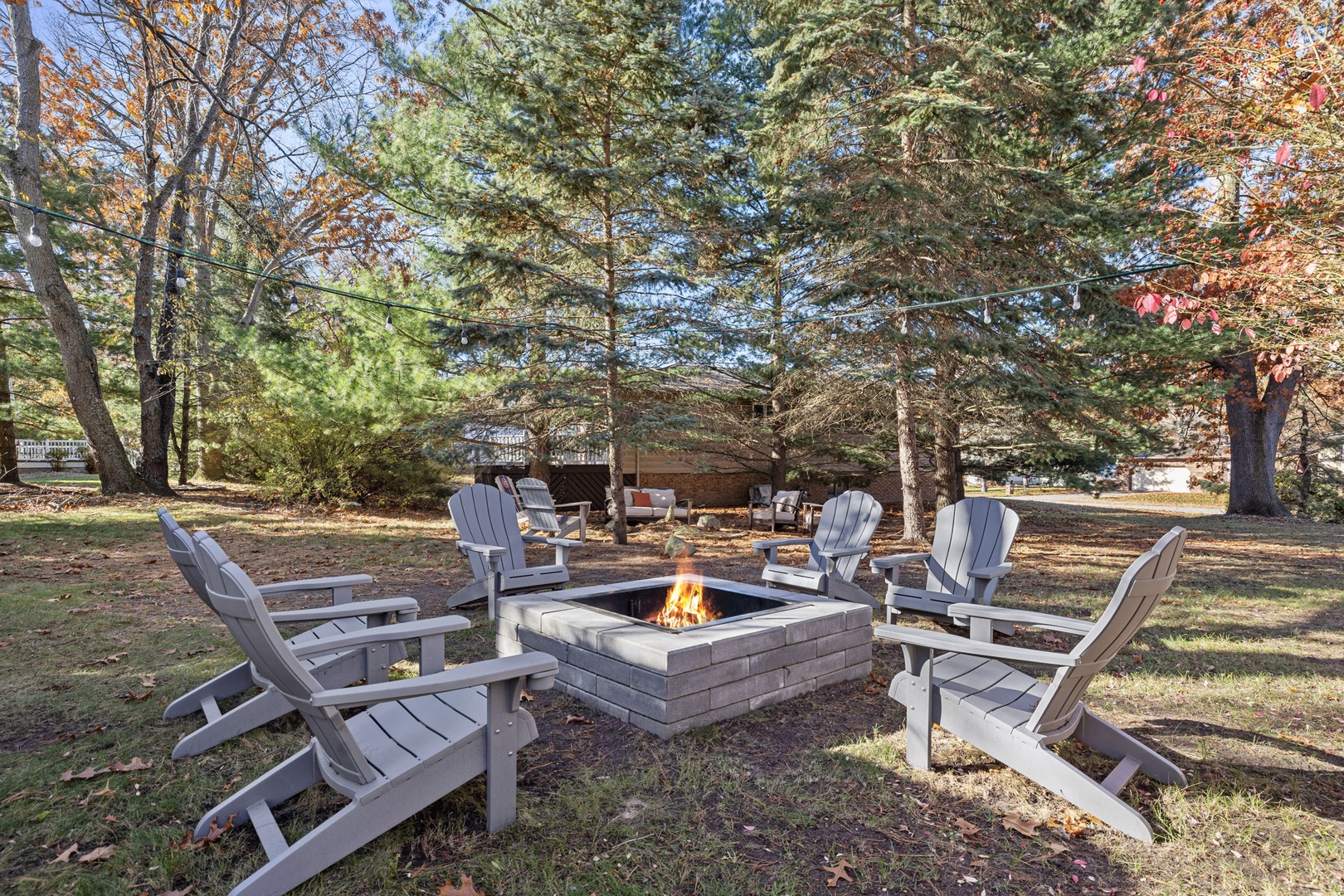 Sitting in an Adirondack chair around a firepit surrounded by tall trees… Priceless.