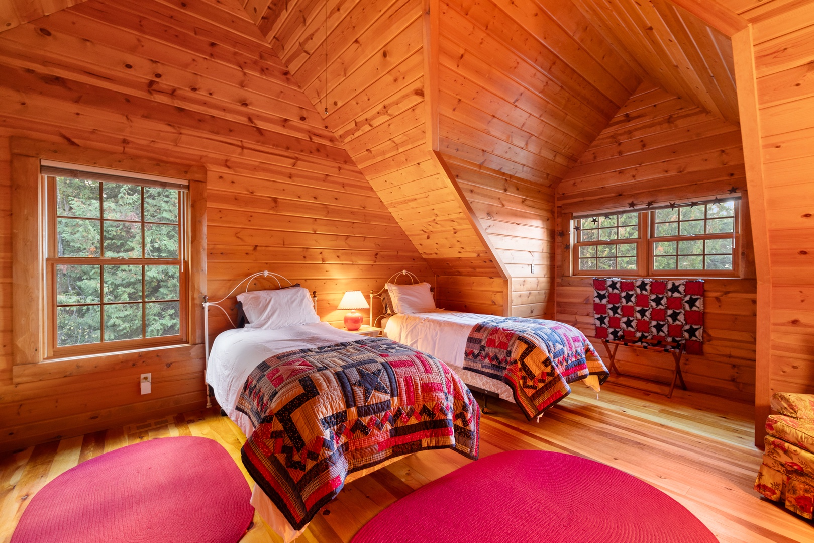 Curl up in this cozy bedroom with two twin beds.