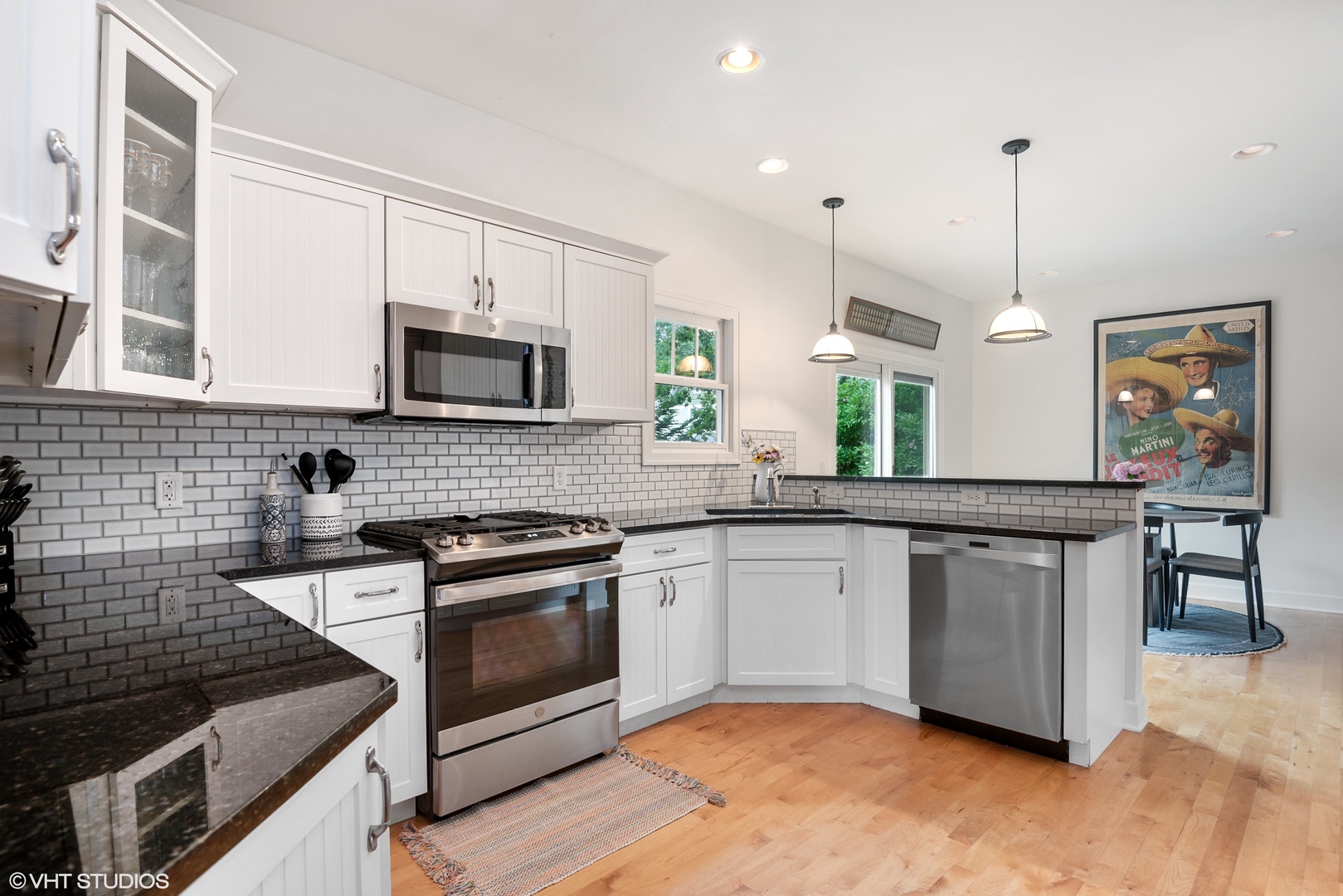 All-new high-end appliances accompanied by gorgeous marble countertops enhance the open-concept kitchen.