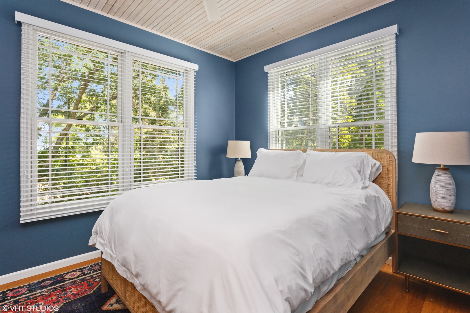 Bedroom 2 has a cozy queen bed perfect for snuggling after a great day on the lake.