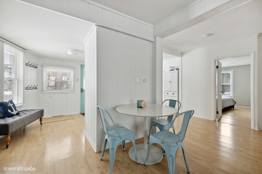 Gather around this charming table and chairs for a cozy meal or a cup of coffee.